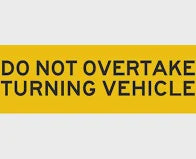DO NOT OVERTAKE TURNING VEHICLE YELLOW REFLECTIVE SIGN 300x100mm